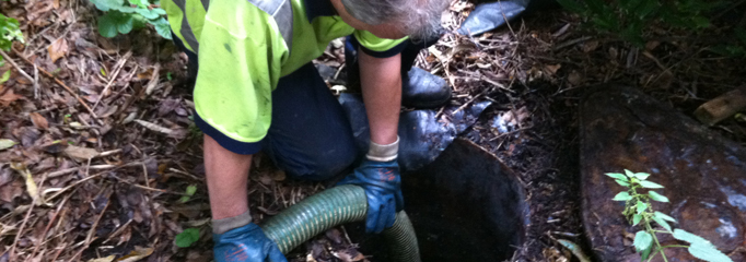 septic tank overflowing with water